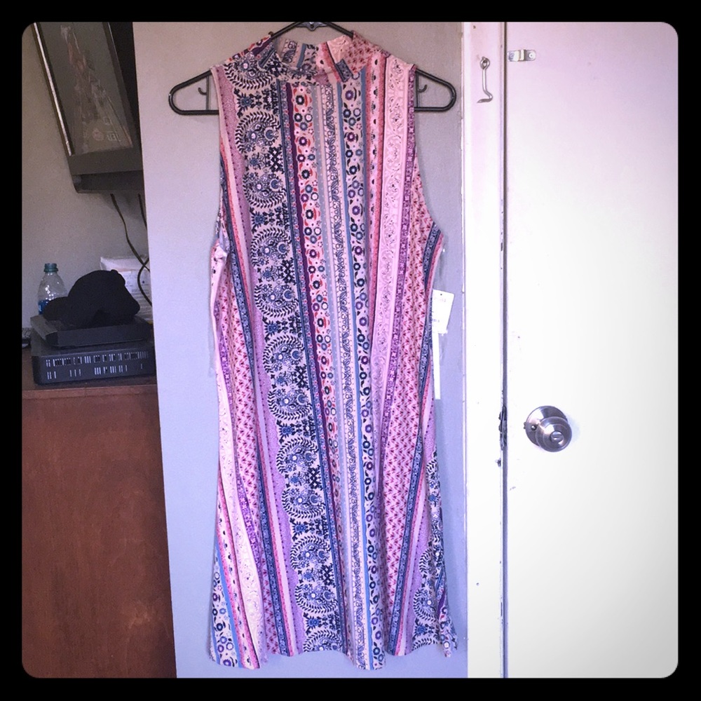 Sleeveless mockneck dress